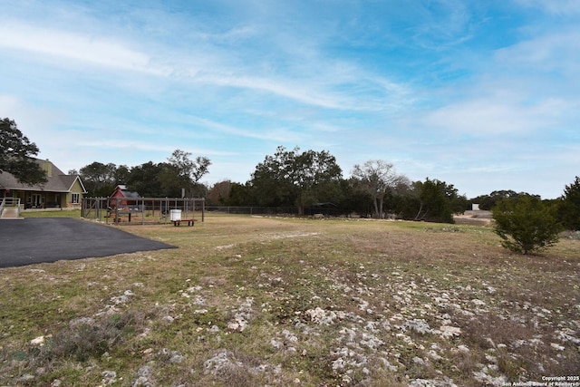 view of yard featuring fence