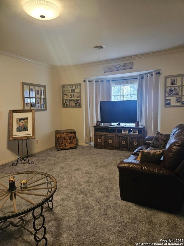 living room with carpet flooring, visible vents, and crown molding