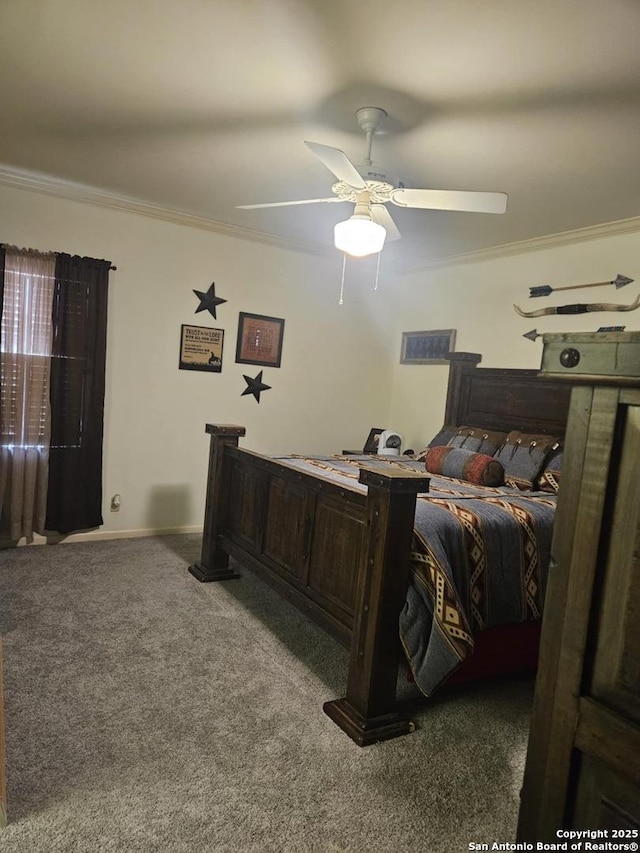 carpeted bedroom featuring ceiling fan, ornamental molding, and baseboards