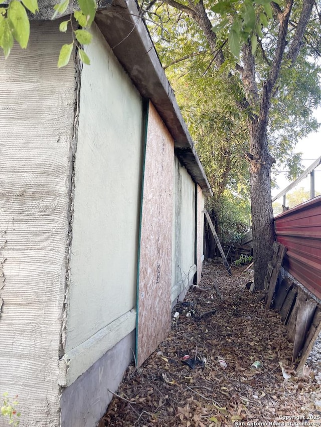 view of home's exterior with stucco siding