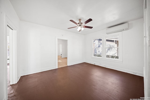 empty room featuring a ceiling fan, a wall unit AC, and baseboards