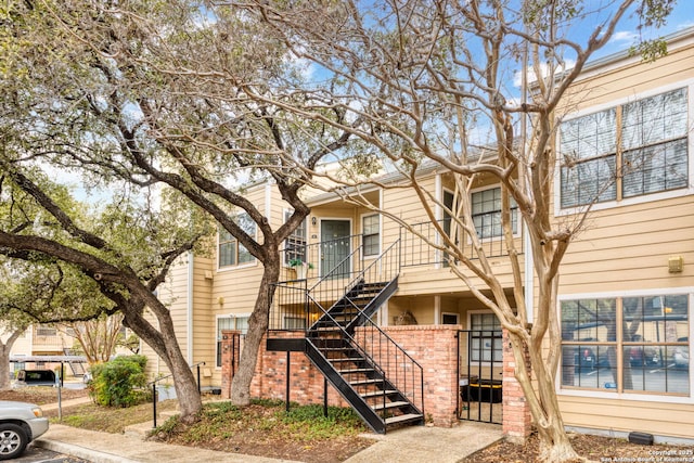 view of front of property with stairs