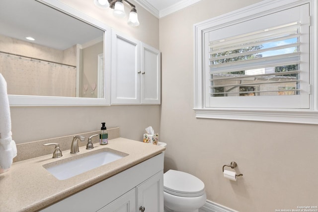 bathroom with toilet, curtained shower, crown molding, and vanity