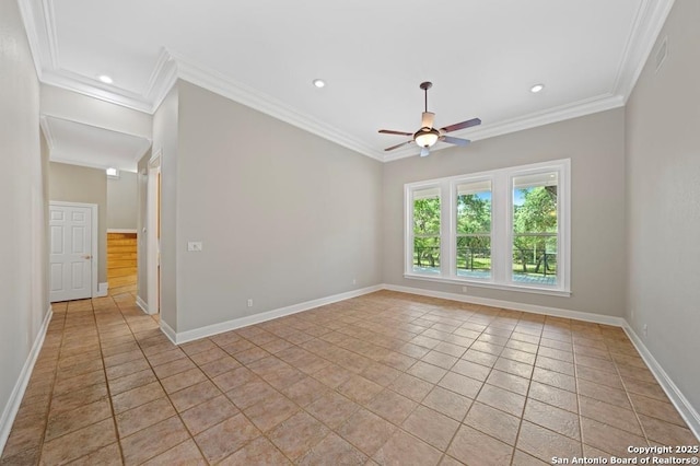 unfurnished room with ornamental molding, a ceiling fan, and baseboards