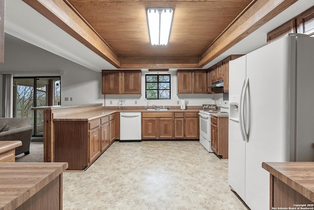 kitchen with wooden ceiling, under cabinet range hood, white appliances, butcher block counters, and a raised ceiling