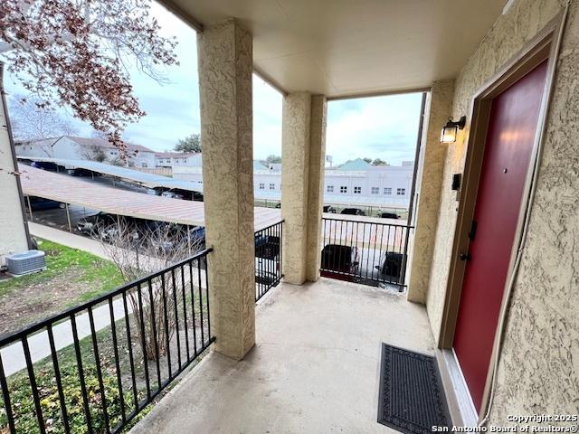 balcony featuring a residential view