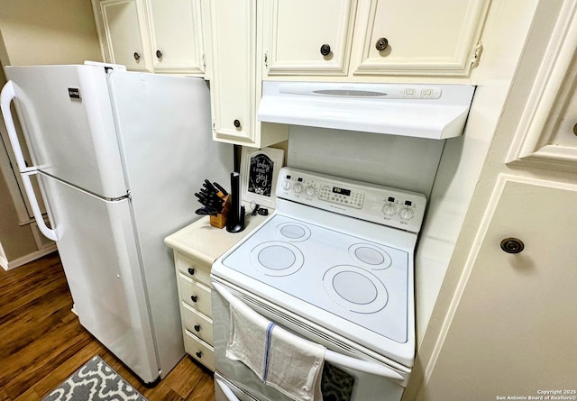 kitchen with dark wood-style floors, light countertops, white cabinetry, white appliances, and under cabinet range hood