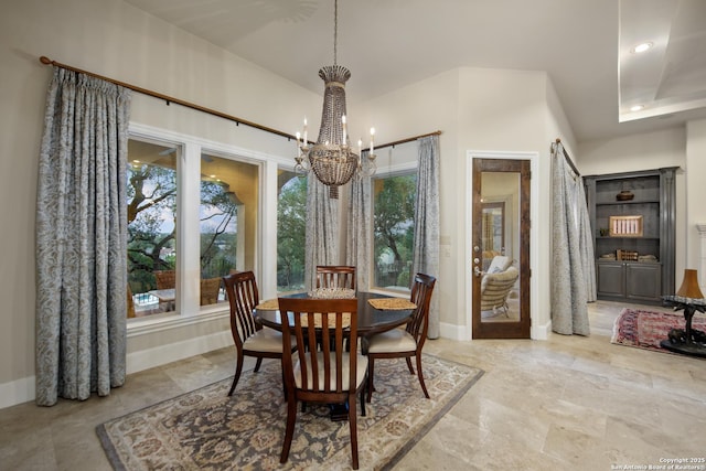 dining room featuring baseboards, recessed lighting, and a notable chandelier