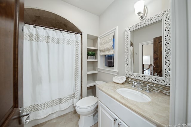 full bath with vanity and toilet