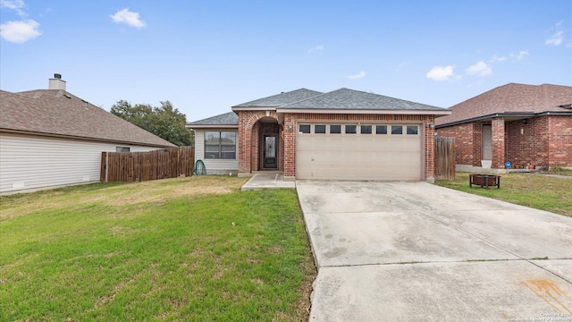 ranch-style house with driveway, a front lawn, an attached garage, and brick siding