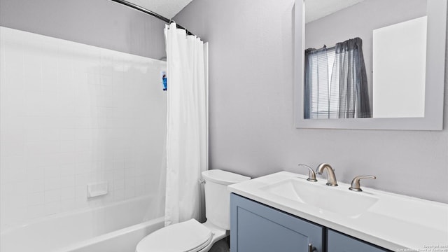 bathroom with toilet, a textured ceiling, shower / bath combination with curtain, and vanity