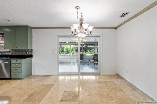 unfurnished dining area featuring baseboards, crown molding, visible vents, and a notable chandelier