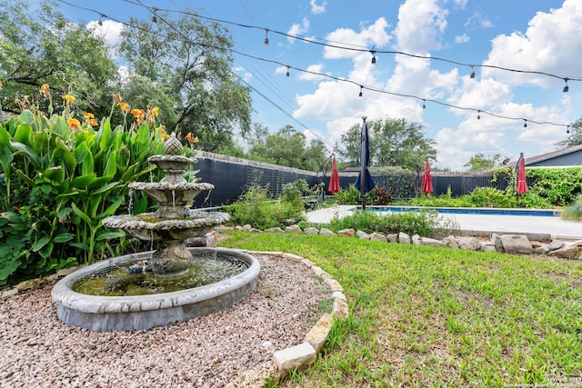 view of yard with fence