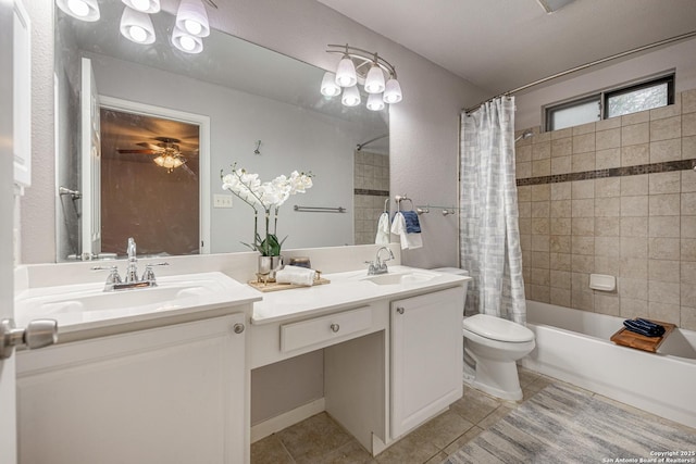 bathroom with tile patterned floors, a sink, and toilet