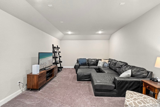 living room with lofted ceiling, baseboards, and carpet flooring