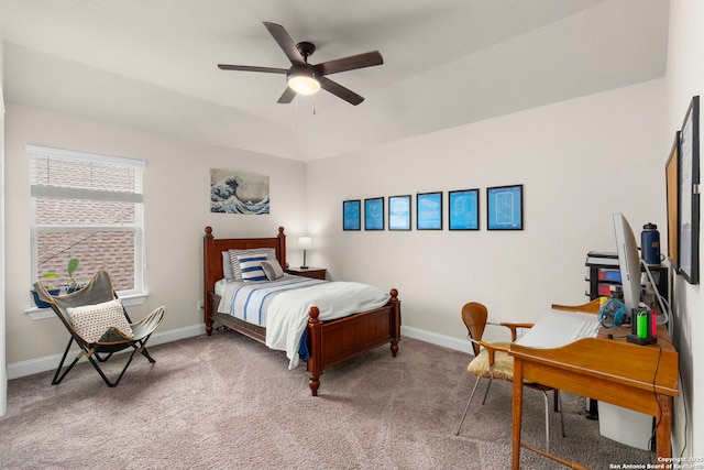 bedroom featuring vaulted ceiling, ceiling fan, light colored carpet, and baseboards