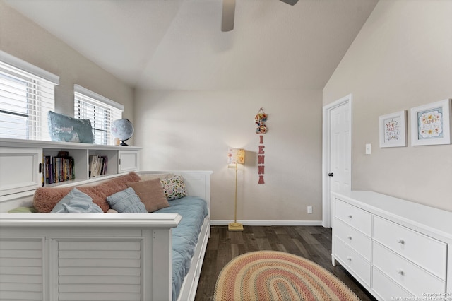 sitting room featuring a ceiling fan, dark wood finished floors, vaulted ceiling, and baseboards