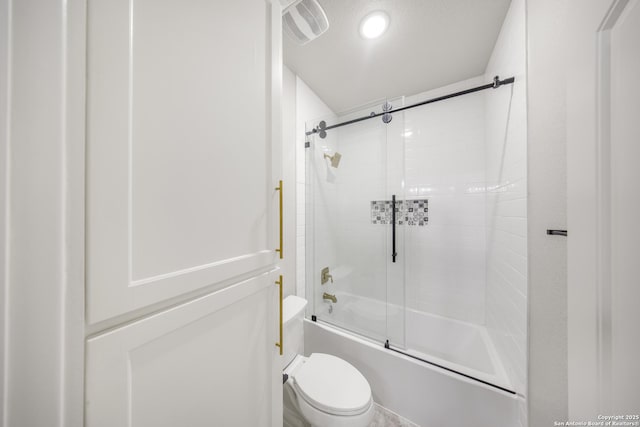 full bath featuring toilet, shower / bath combination with glass door, and visible vents