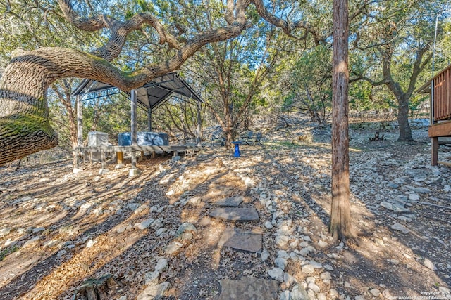 view of yard with a carport