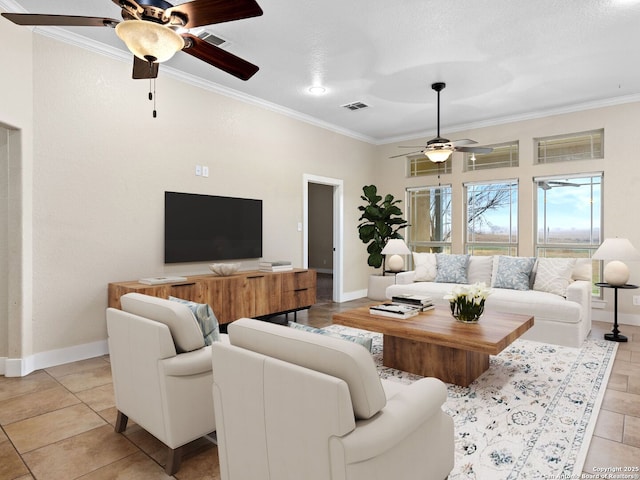 living room featuring visible vents, crown molding, and baseboards