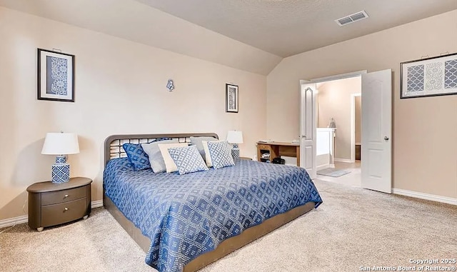 carpeted bedroom featuring lofted ceiling, visible vents, and baseboards