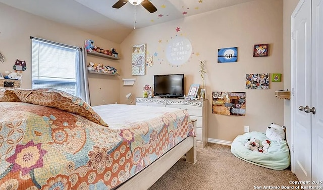 bedroom with lofted ceiling, ceiling fan, carpet, and baseboards