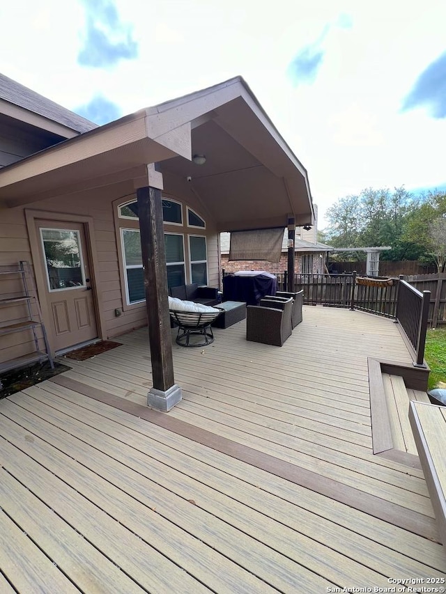 deck with an outdoor living space