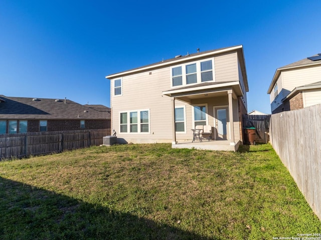11830 Bricewood Pass, San Antonio, TX 78254 - back of property with a yard, a fenced backyard, and a patio