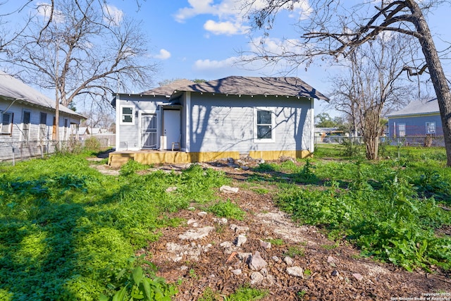 view of front of property with fence