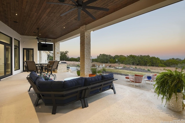 view of patio / terrace with outdoor dining space, area for grilling, and an outdoor hangout area