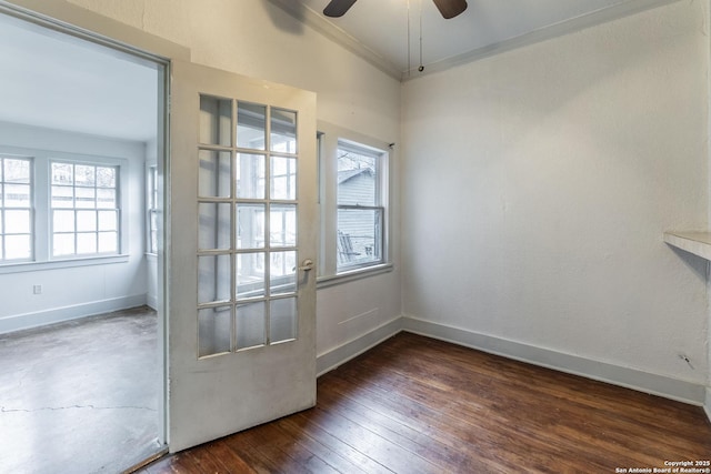 entryway with baseboards, dark wood-style flooring, a ceiling fan, and crown molding