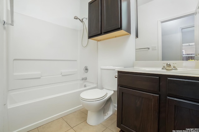 bathroom with bathing tub / shower combination, vanity, toilet, and tile patterned floors