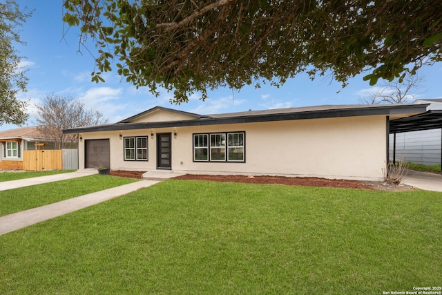 single story home featuring driveway, a front lawn, and stucco siding