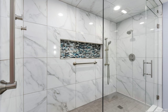 bathroom featuring a shower stall