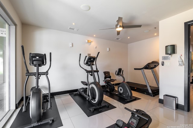 workout room featuring light tile patterned floors, ceiling fan, recessed lighting, visible vents, and baseboards