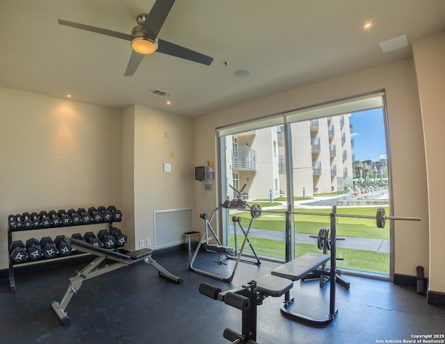 gym featuring baseboards, visible vents, and recessed lighting