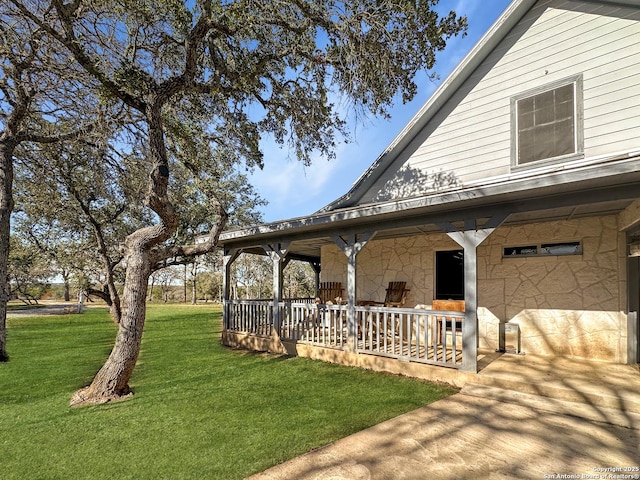 view of yard with a porch