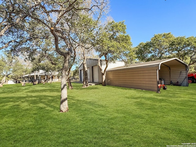 view of yard featuring a carport