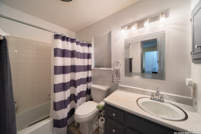 bathroom featuring a textured ceiling, toilet, shower / bath combo with shower curtain, and vanity