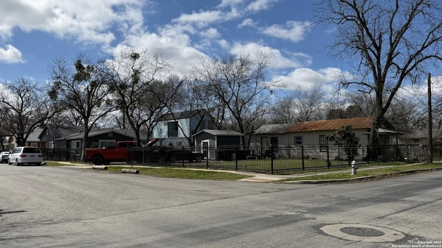 view of road with curbs, sidewalks, and a residential view