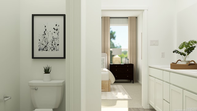 10317 Bridgton Ml, San Antonio, TX 78254 - bathroom with toilet, vanity, and ensuite bath