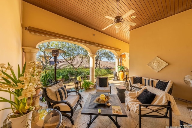 view of patio / terrace featuring a ceiling fan, outdoor lounge area, and fence