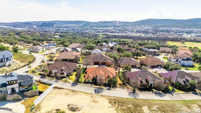 aerial view featuring a residential view and a mountain view