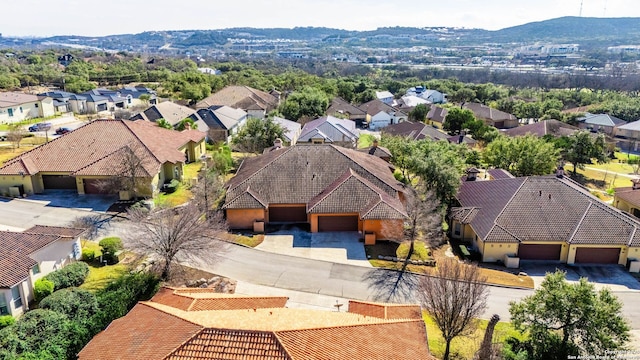 aerial view featuring a mountain view and a residential view