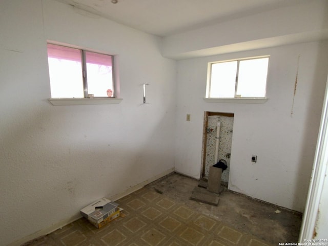 washroom with laundry area and hookup for an electric dryer