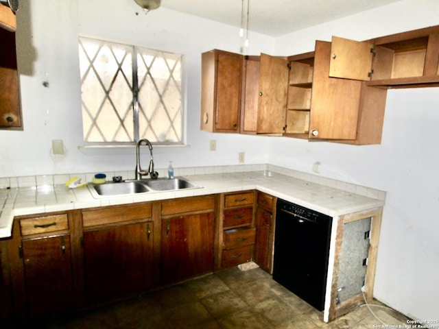 kitchen with a sink, tile counters, brown cabinets, dishwasher, and open shelves