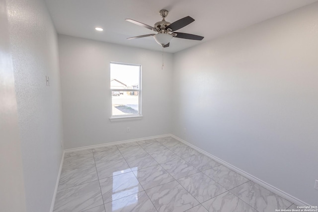 unfurnished room featuring marble finish floor, ceiling fan, baseboards, and recessed lighting