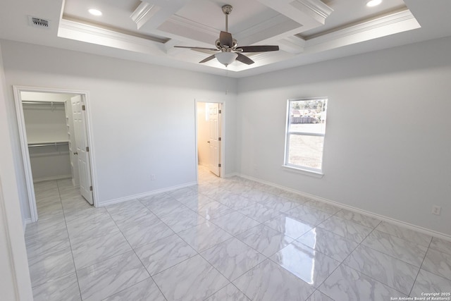 unfurnished bedroom featuring baseboards, visible vents, and coffered ceiling