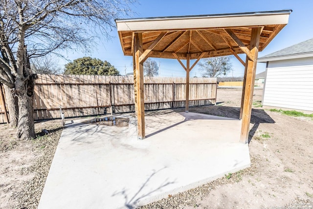 view of patio with fence