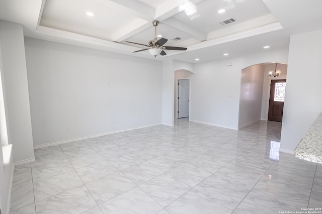 empty room with visible vents, arched walkways, coffered ceiling, baseboards, and ceiling fan with notable chandelier